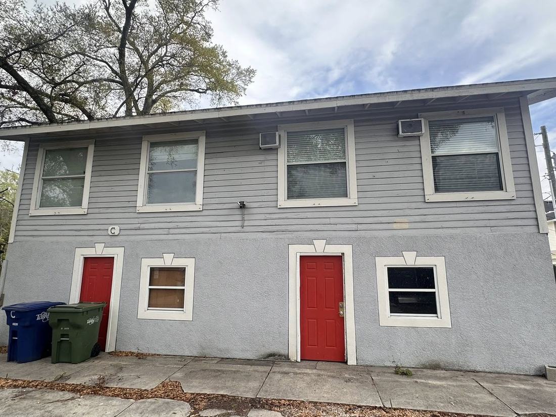 Weathered siding and trim before any work