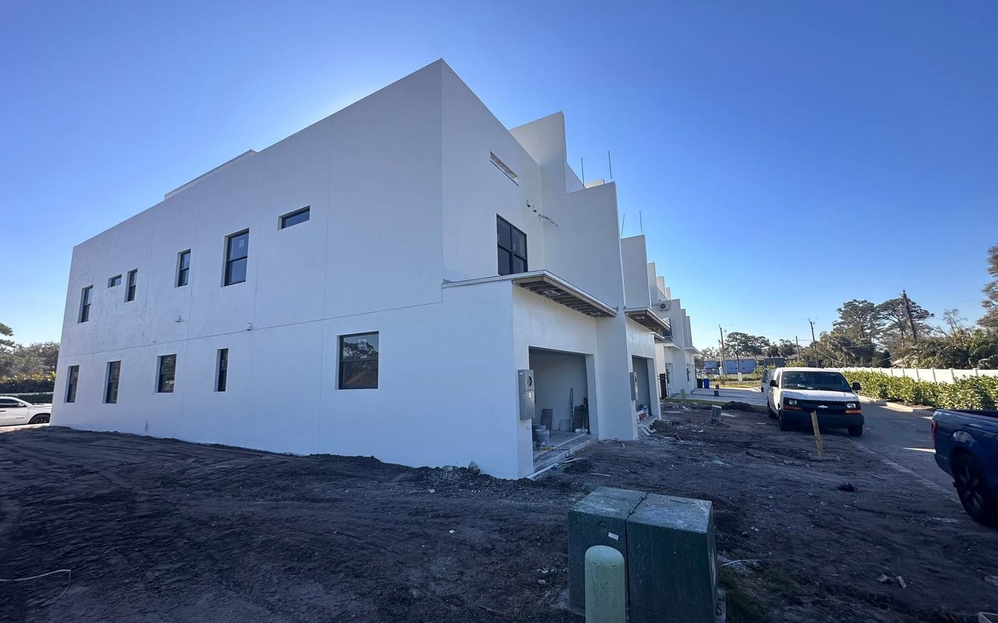 The same townhouse block after the finished coat
