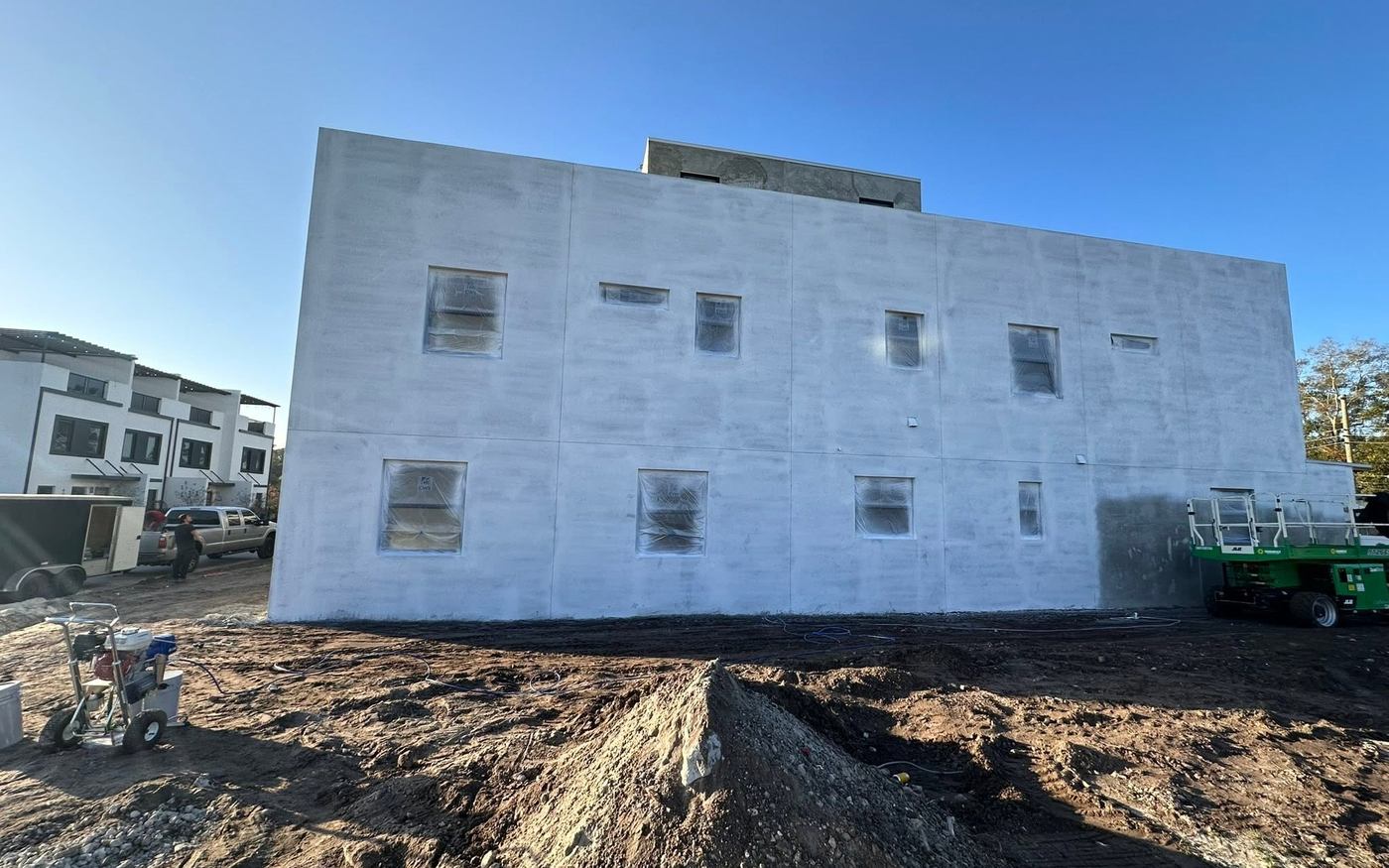 New townhouse block during exterior preparation