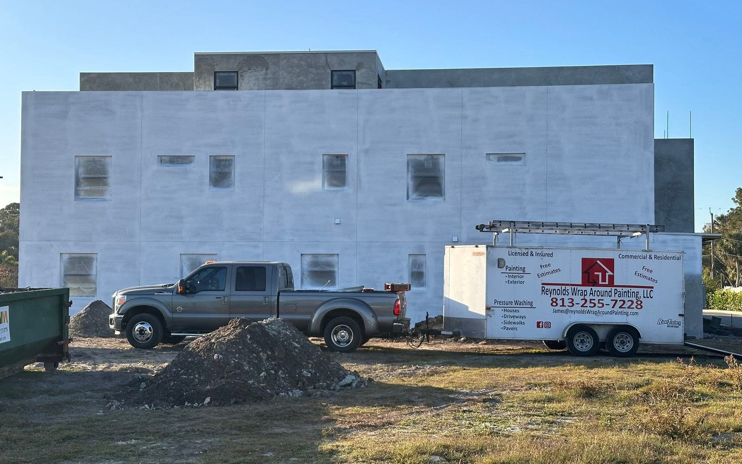 Reynolds Wrap Around Painting trailer on a job site