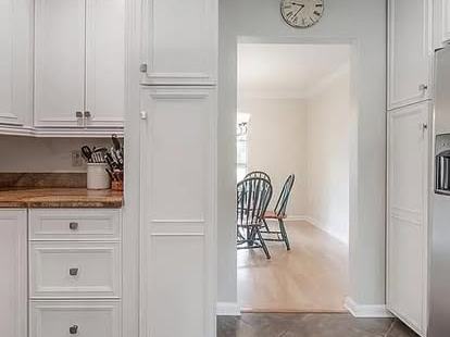 Hallway and kitchen after interior repaint